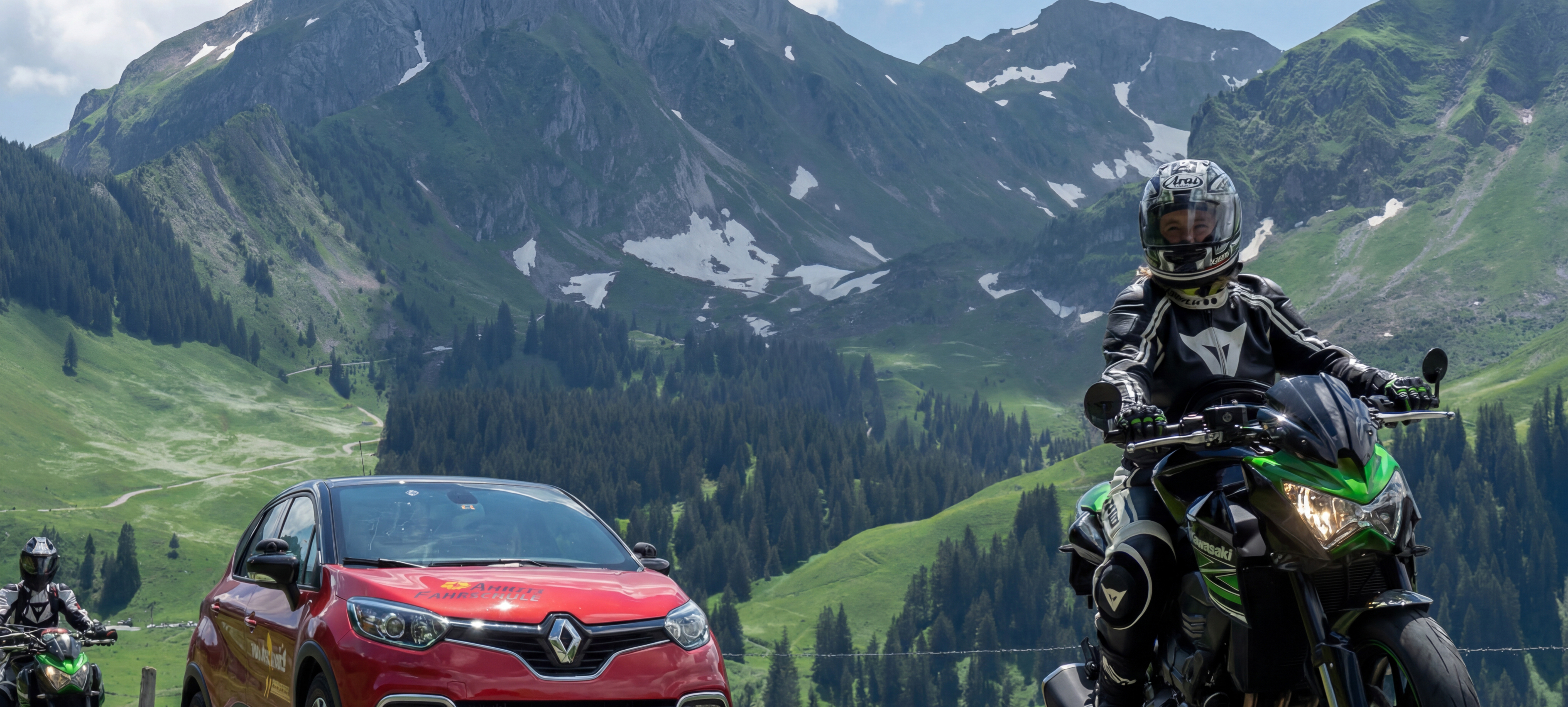 Car driving through Swiss mountain pass